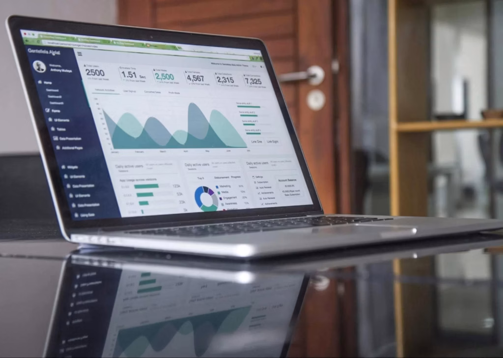 SEO reporting dashboard on a laptop screen, displaying site performance metrics and analytics. Outbound link SEO strategies can improve key indicators like traffic and rankings.